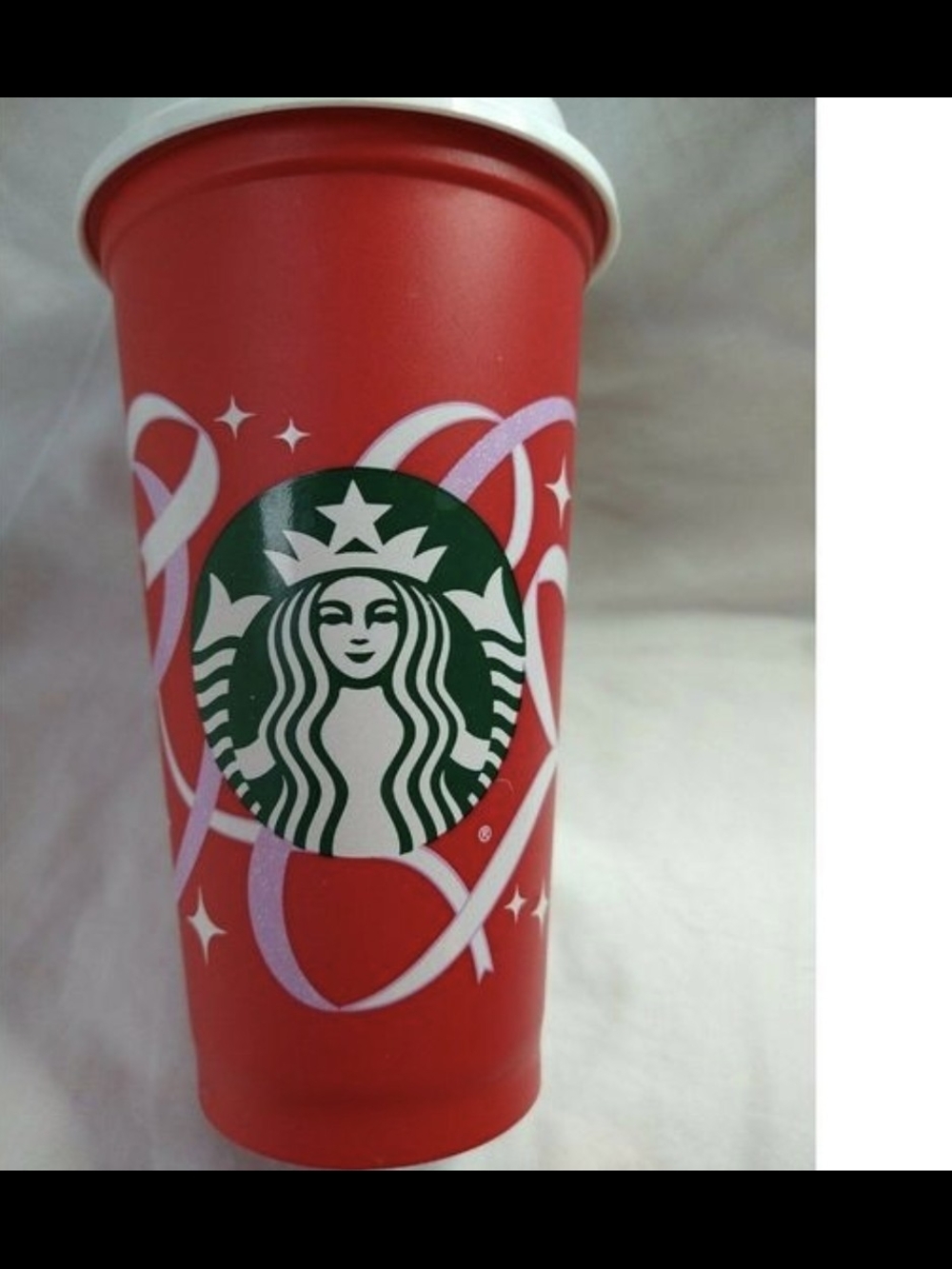 Starbucks Red Cup with Green Logo and Pink Ribbon Accents